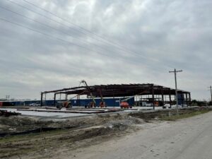 Building progress - The History of Neodesha Plastics, Inc. - Neodesha Plastics, Inc.